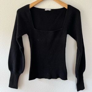 Reformation knit sweater top in black. Size small. Brand new never worn